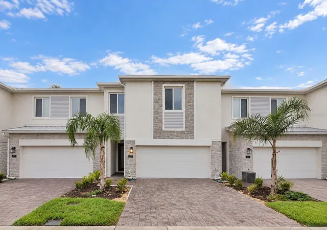 Photo 1 of Townhouse for sale at 433 Bogey Dr, Davenport, FL 33896 | MLS# O6439538 | Listing updated on 2026-09-19