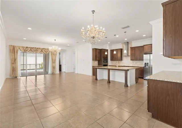 Photo 3 of Single family home for sale at 8148 Cleobury Dr, Orlando, FL 32832 | MLS# O6439542 | Listing updated on 2026-09-05