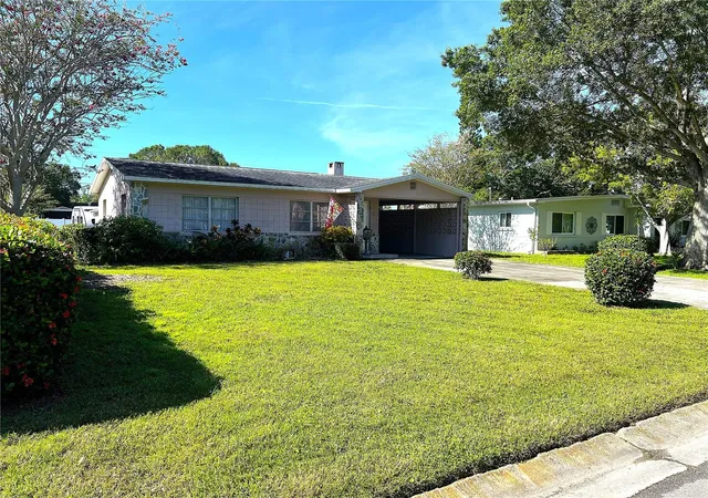 Photo 29 of Single family home for sale at 1400 57th Avenue N, Saint Petersburg, FL 33703 | MLS# TB8545991 | Listing updated on 2026-09-06