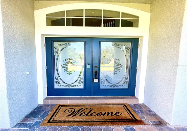 Photo 2 of Single family home for sale at 1405 Misty Glen Ln, Clermont, FL 34711 | MLS# TB8546012 | Listing updated on 2026-10-06