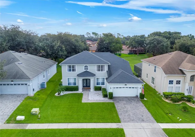 Photo 3 of Single family home for sale at 1405 Misty Glen Ln, Clermont, FL 34711 | MLS# TB8546012 | Listing updated on 2026-10-06