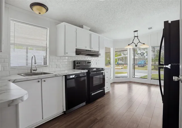 Photo 3 of Manufactured home for sale at 9378 Scepter Ave, Brooksville, FL 34613 | MLS# W7889255 | Listing updated on 2026-09-24
