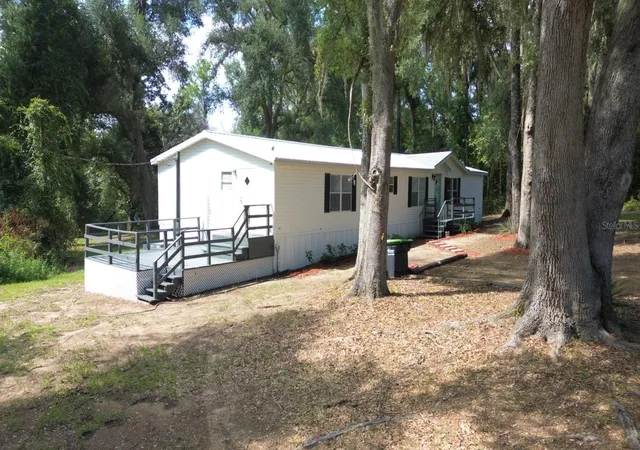 Photo 2 of Manufactured home for sale at 3391 Nw Bur Oak Pl, Jennings, FL 32053 | MLS# O6439601 | Listing updated on 2026-10-21