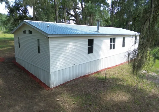 Photo 3 of Manufactured home for sale at 3391 NW Bur Oak Pl, Jennings, FL 32053 | MLS# O6439601 | Listing updated on 2026-10-21