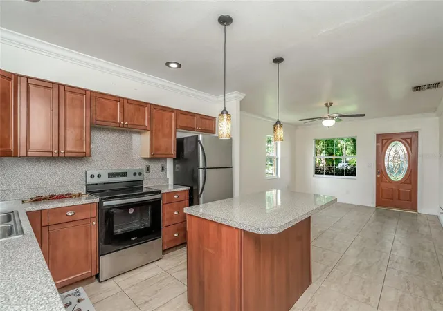Photo 4 of Single family home for sale at 8001 N Hubert Ave, Tampa, FL 33614 | MLS# O6439612 | Listing updated on 2026-09-26
