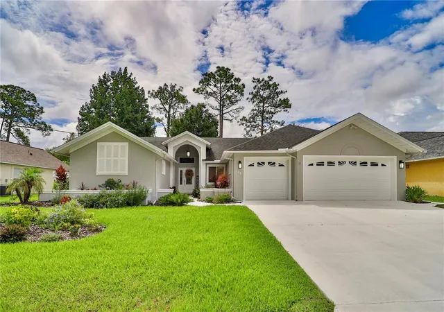 Photo 1 of Single family home for sale at 112 Ne Wellstone Dr, Palm Coast, FL 32164 | MLS# FC321257 | Listing updated on 2026-09-08