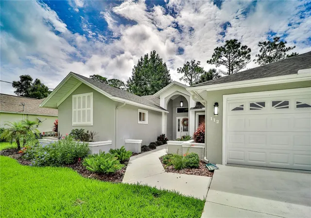 Photo 3 of Single family home for sale at 112 NE Wellstone Dr, Palm Coast, FL 32164 | MLS# FC321257 | Listing updated on 2026-09-08
