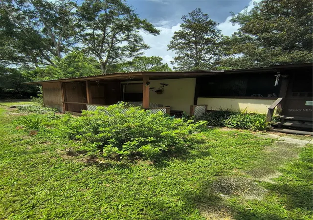 Photo 2 of Manufactured home for sale at 18250 Caufield Rd, Spring Hill, FL 34610 | MLS# W7889268 | Listing updated on 2026-09-07
