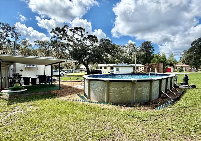 Photo 3 of Manufactured home for sale at 19049 Se 16th Place, Silver Springs, FL 34488 | MLS# OM731828 | Listing updated on 2026-09-07