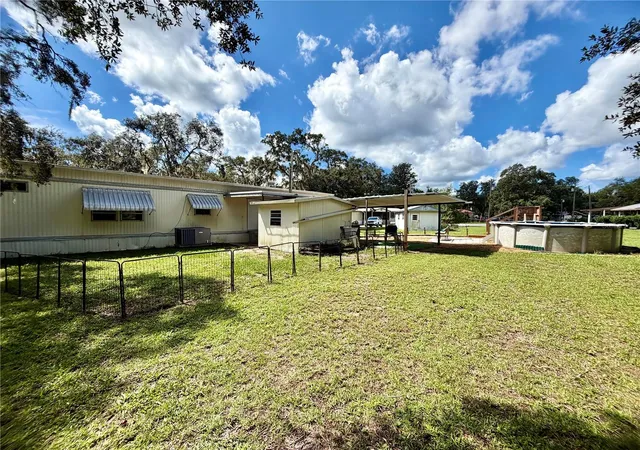 Photo 4 of Manufactured home for sale at 19049 SE 16th Place, Silver Springs, FL 34488 | MLS# OM731828 | Listing updated on 2026-09-07