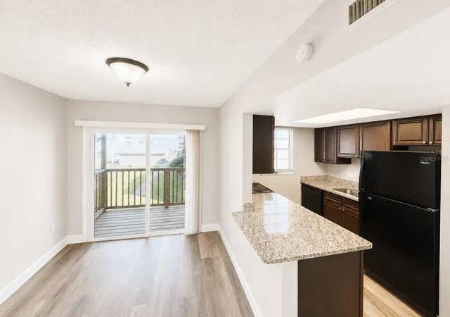 Listing Photo 5 - Condo for sale in building located at 2791 L B Mcleod Rd, ORLANDO, FL 32805 - Unit #D