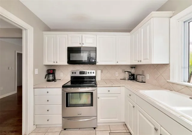 Photo 3 of Single family home for sale at 1712 Siesta Dr, Sarasota, FL 34239 | MLS# A4705310 | Listing updated on 2026-09-08