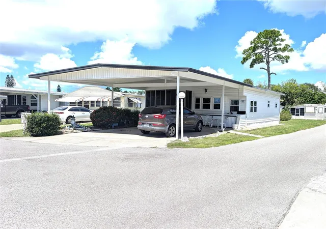 Photo 2 of Manufactured home for sale at 3275 26th Avenue E #91, Bradenton, FL 34208 | MLS# A4705312 | Listing updated on 2026-09-08