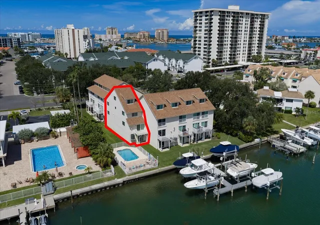 Photo 1 of Townhouse for sale at 301 Is Way #E, Clearwater Beach, FL 33767 | MLS# TB8546269 | Listing updated on 2026-10-17