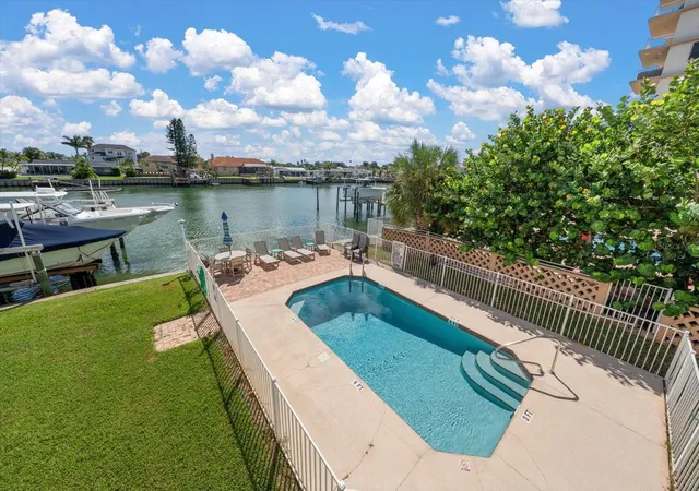 Photo 3 of Townhouse for sale at 301 Is Way #E, Clearwater Beach, FL 33767 | MLS# TB8546269 | Listing updated on 2026-10-17