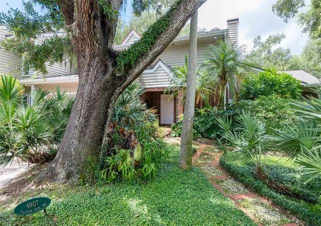 Photo 1 of Townhouse for sale at 4907 Pilgrims Path Way, Tampa, FL 33611 | MLS# TB8546270 | Listing updated on 2026-10-30