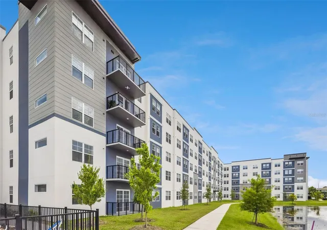 Photo 1 of Condo for sale at 5587 Millenia Park Blvd #203, Orlando, FL 32839 | MLS# O6439817 | Listing updated on 2026-09-26
