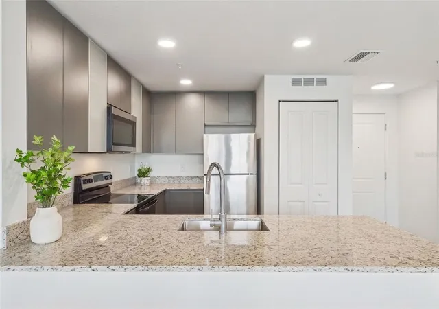 Photo 4 of Condo for sale at 5587 Millenia Park Blvd #203, Orlando, FL 32839 | MLS# O6439817 | Listing updated on 2026-09-26