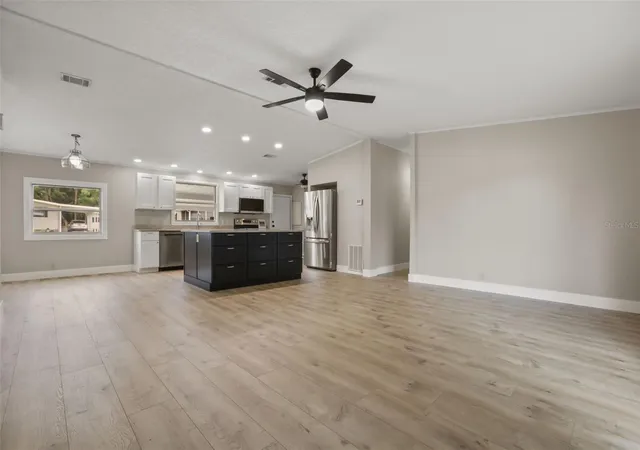 Photo 4 of Manufactured home for sale at 3928 N Citrus Cir #691, Zellwood, FL 32798 | MLS# O6439821 | Listing updated on 2026-10-04