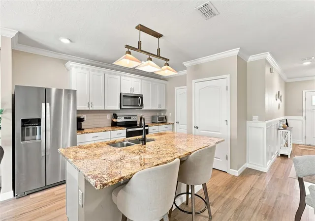 Photo 3 of Townhouse for sale at 65 Bella Lago Cir, Port Orange, FL 32129 | MLS# V4951160 | Listing updated on 2026-09-25