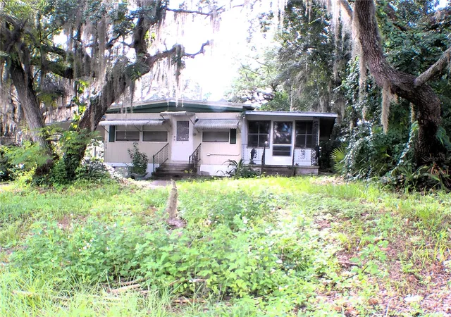 Photo 2 of Manufactured home for sale at 1930 Se 188th Court, Silver Springs, FL 34488 | MLS# OM731857 | Listing updated on 2026-09-20