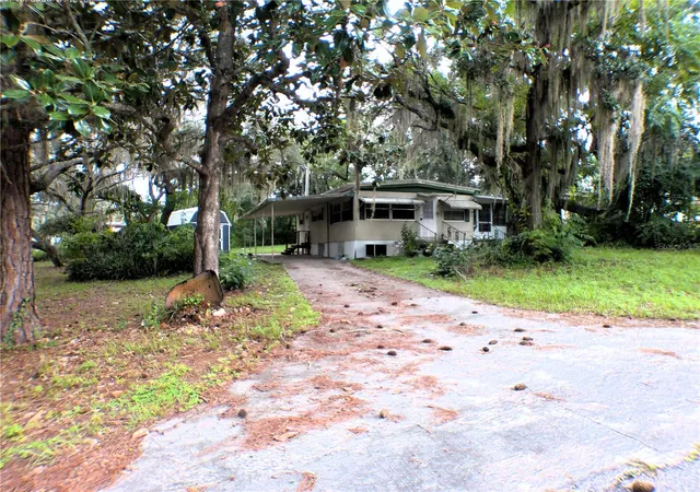 Photo 3 of Manufactured home for sale at 1930 Se 188th Court, Silver Springs, FL 34488 | MLS# OM731857 | Listing updated on 2026-09-20