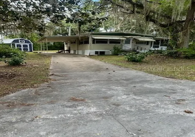 Photo 3 of Manufactured home for sale at 1930 SE 188th Court, Silver Springs, FL 34488 | MLS# OM731857 | Listing updated on 2026-09-20