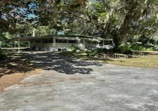 Photo 4 of Manufactured home for sale at 1930 SE 188th Court, Silver Springs, FL 34488 | MLS# OM731857 | Listing updated on 2026-09-20