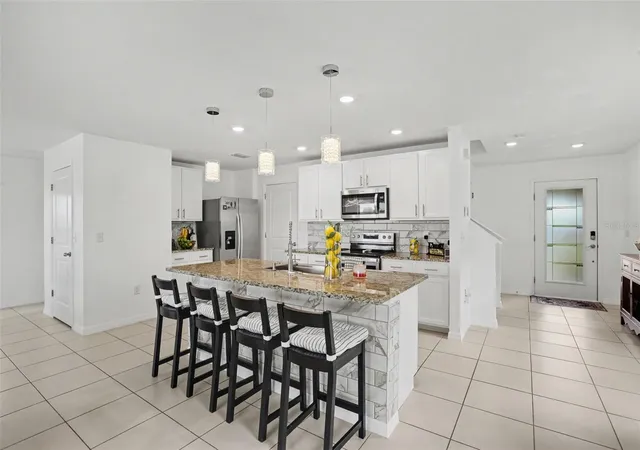 Photo 2 of Single family home for sale at 498 Olive Conch St, Ruskin, FL 33570 | MLS# TB8546367 | Listing updated on 2026-09-18