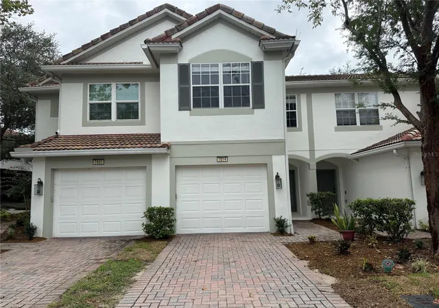 Photo 1 of Townhouse for sale at 7014 Cadiz Blvd, Orlando, FL 32819 | MLS# O6439906 | Listing updated on 2026-09-08