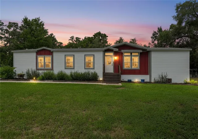 Photo 1 of Manufactured home for sale at 341 Suncoast Blvd, Spring Hill, FL 34608 | MLS# TB8546385 | Listing updated on 2026-09-08