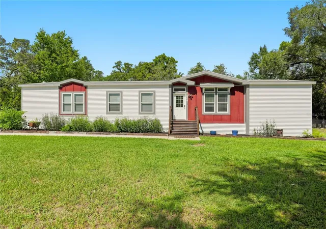 Photo 2 of Manufactured home for sale at 341 Suncoast Blvd, Spring Hill, FL 34608 | MLS# TB8546385 | Listing updated on 2026-09-08