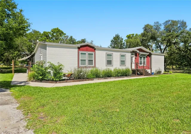Photo 3 of Manufactured home for sale at 341 Suncoast Blvd, Spring Hill, FL 34608 | MLS# TB8546385 | Listing updated on 2026-09-08
