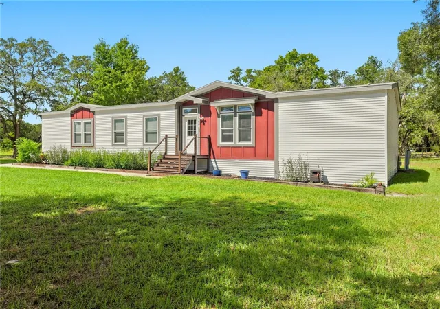 Photo 3 of Manufactured home for sale at 341 Suncoast Blvd, Spring Hill, FL 34608 | MLS# TB8546385 | Listing updated on 2026-09-08