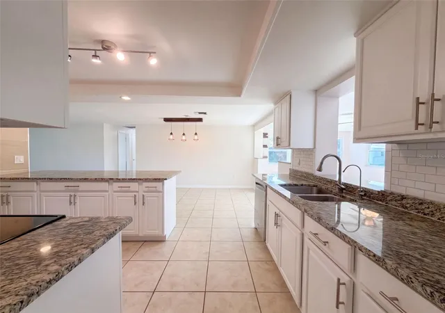Photo 2 of Sale Pending at 145 Dartmouth Dr NW, PORT CHARLOTTE, FL 33952 | MLS# O6439938 | Listing updated on 2026-10-15