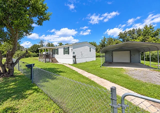 Photo 1 of Manufactured home for sale at 9027 Hammock Loop, Polk City, FL 33868 | MLS# TB8546418 | Listing updated on 2026-09-14
