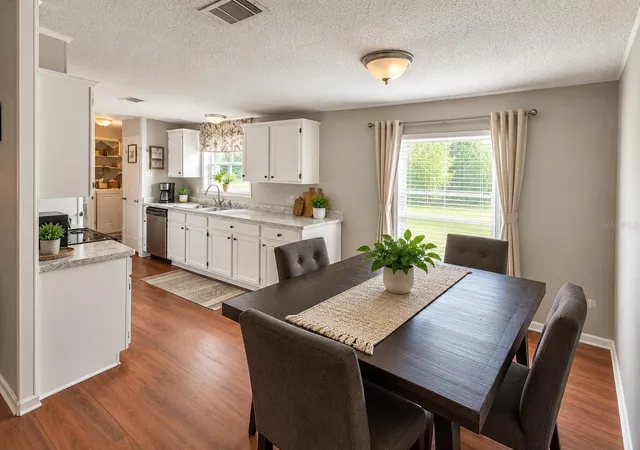 Photo 2 of Manufactured home for sale at 9027 Hammock Loop, Polk City, FL 33868 | MLS# TB8546418 | Listing updated on 2026-09-14