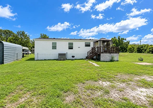 Photo 3 of Manufactured home for sale at 9027 Hammock Loop, Polk City, FL 33868 | MLS# TB8546418 | Listing updated on 2026-09-14