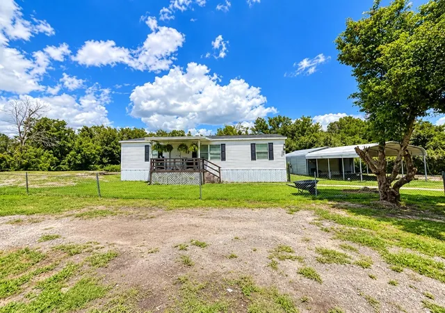 Photo 3 of Manufactured home for sale at 9027 Hammock Loop, Polk City, FL 33868 | MLS# TB8546418 | Listing updated on 2026-09-14