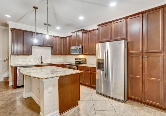 Photo 4 of Townhouse for sale at 9986 Eagle Crk Ctr Blvd, Orlando, FL 32832 | MLS# O6439940 | Listing updated on 2026-09-21