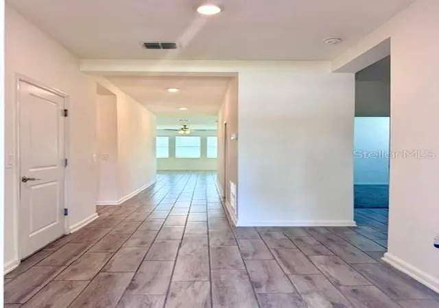 Photo 4 of Single family home for sale at 33611 Sky Blossom Cir, Leesburg, FL 34788 | MLS# O6439942 | Listing updated on 2026-10-10