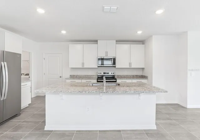 Photo 4 of Single family home for sale at 11341 Bellewood Ter, Parrish, FL 34219 | MLS# TB8546427 | Listing updated on 2026-10-12