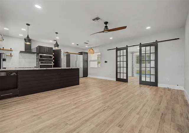Photo 4 of Single family home for sale at 1304 Parkwood St, Clearwater, FL 33755 | MLS# TB8546448 | Listing updated on 2026-09-21
