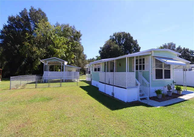 Photo 1 of Manufactured home for sale at 417 Ne 64th Avenue, Ocala, FL 34470 | MLS# OM731878 | Listing updated on 2026-10-01