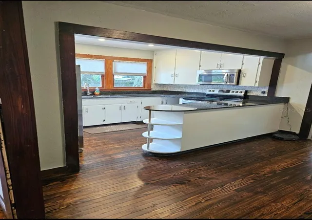 Photo 3 of Single family home for sale at 1047 NE 19th Street, Ocala, FL 34470 | MLS# OM731886 | Listing updated on 2026-09-12