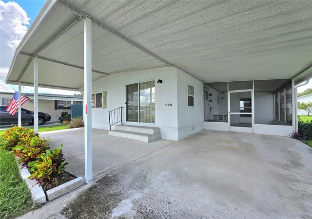 Photo 2 of Manufactured home for sale at 37048 Lois Ave, Zephyrhills, FL 33542 | MLS# TB8546533 | Listing updated on 2026-09-11