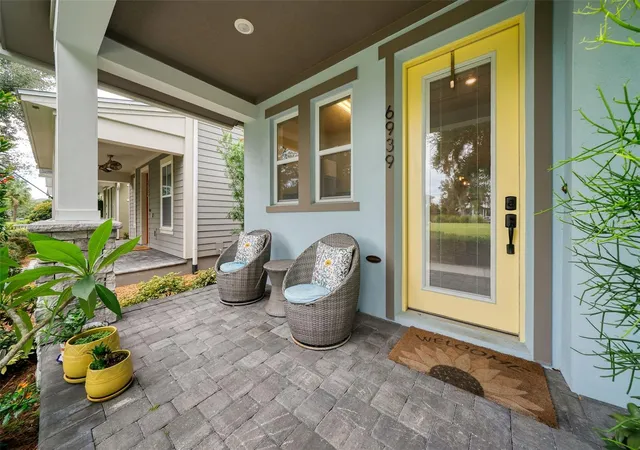 Photo 3 of Single family home for sale at 6939 Higgs Aly, Orlando, FL 32827 | MLS# O6440091 | Listing updated on 2026-09-24
