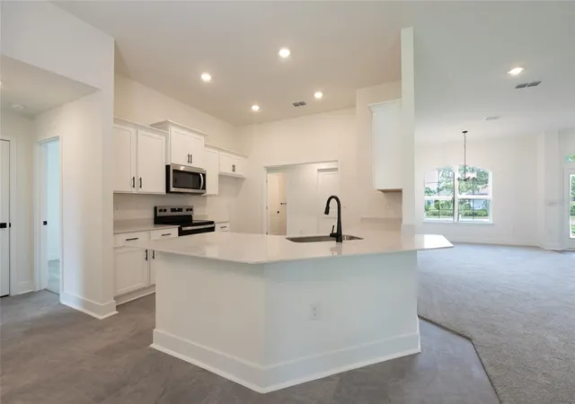 Photo 2 of Sale Pending at 13 Princeton Ln, Palm Coast, FL 32164 | MLS# FC321291 | Listing updated on 2026-10-20