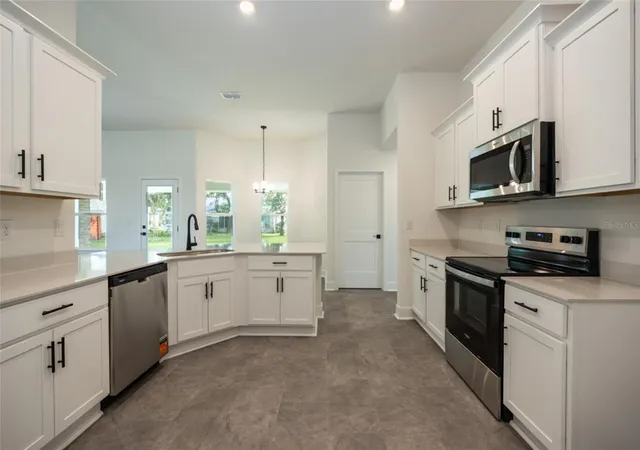 Photo 3 of Sale Pending at 13 Princeton Ln, Palm Coast, FL 32164 | MLS# FC321291 | Listing updated on 2026-10-20