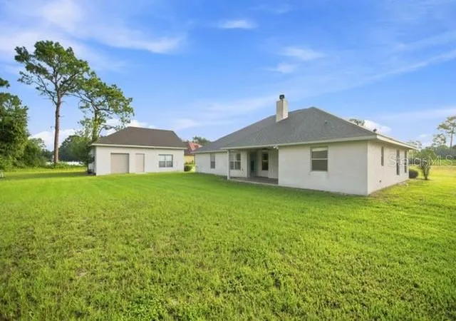 Photo 1 of Single family home for sale at 5931 NE 57th Loop, Silver Springs, FL 34488 | MLS# OM731899 | Listing updated on 2026-09-21
